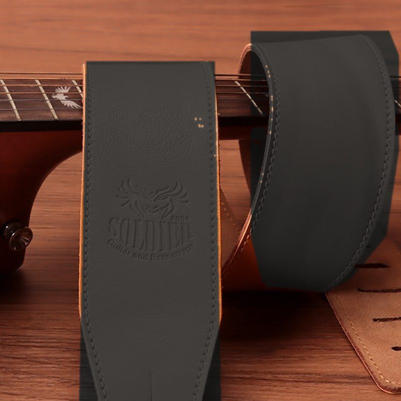 The maker logo embossed into the leather, shown in black